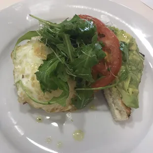 Avocado toast -- light with perfectly cooked and runny egg