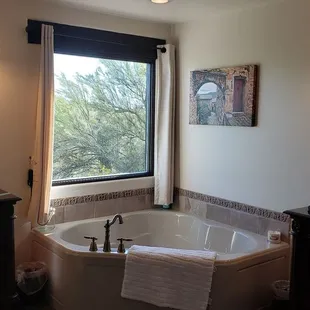 Grab a glass of wine and unwind in this tub.