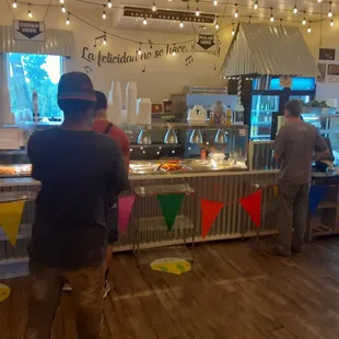 two men in a kitchen