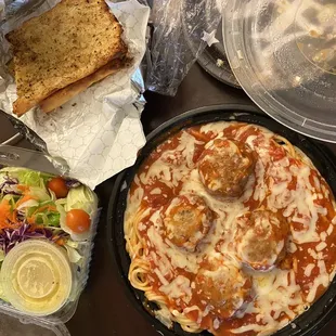 a pizza and a salad