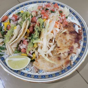 Carnitas tacos, rice with fresh pico, revueleta pupusas (cheese and pork)