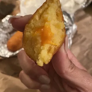 Fried corn meal stick (sorullo) $2 per stick. Menu did NOT specify that it comes with cheese inside.