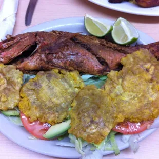Deep fried red snapper with green plantains. So fresh and good.