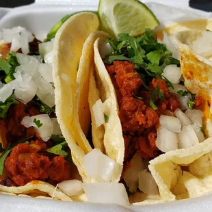 Veggie chorizo tacos ($3.25 each), vegan by default. Great flavor and nice texture.