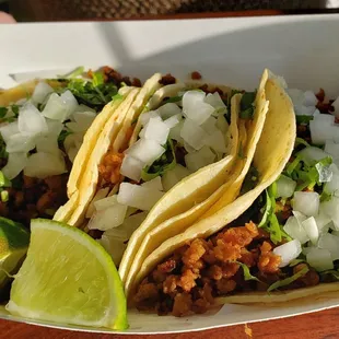 Veggie chorizo tacos ($3.25 each), vegan by default. Super tasty and authentic.