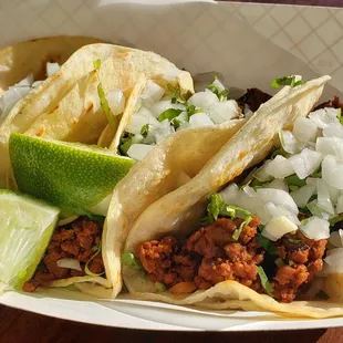 Soy meat tacos ($3.25 each), vegan by default. Delicious and authentic.