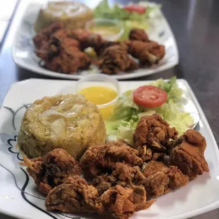 two plates of fried food