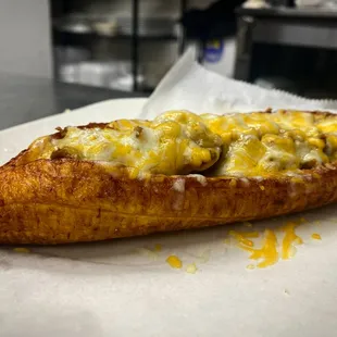 a banana with cheese on it