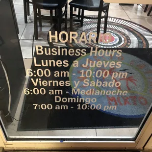 Front door with hours