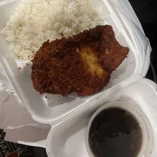 a meal in a styrofoam container