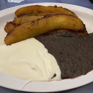 Plantains, beans, and crema