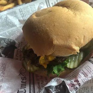 Yummy cheeseburger with all the toppings.