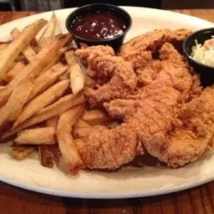 a plate of fried chicken and french fries