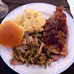Brisket, green beans, potato salad and what&apos;s bbq without a dinner roll.
