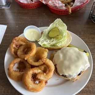 Classic Hamburger with no onion and no tomato upgraded to onion rings.