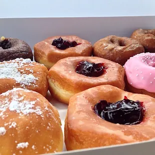a variety of donuts in a box
