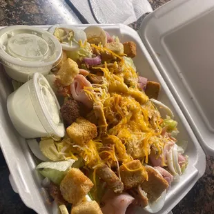 Soggy salad to go with no chicken...completely NOT what I asked for or paid for.