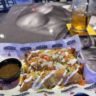 Taquitos with all the fixings. Not too spicy. Just right.