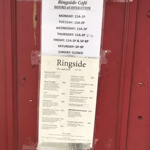 a menu on a red door