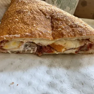 Ham, bacon, cheddar, meatball large Calzone $18