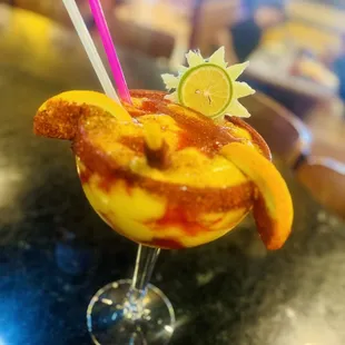 a margarita with a slice of lime