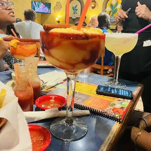 a table with drinks and food