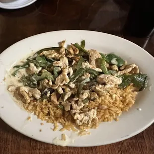 Chicken cheese and rice with bell pepper added
