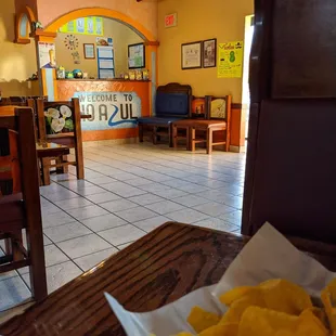 a table with chips in a restaurant