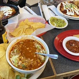 Bowl of posole and tamales.