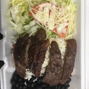 a meal in a styrofoam container