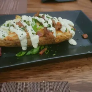 Twice baked potatoes, fully loaded
