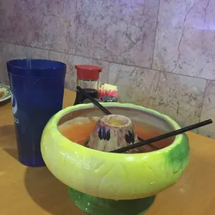 This is my new favorite drink! The scorpion bowl.... Wow! 151 in the middle and they light it with fire.