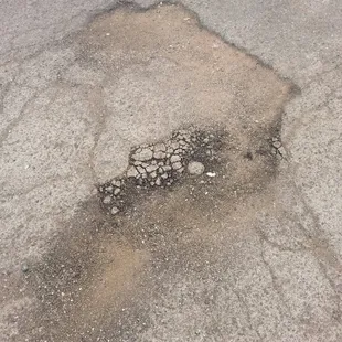 Potholes, loose gravel as roads, check!