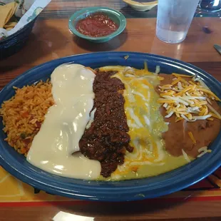 Seafood, brisket, chicken enchaldia platter wirh beans and rice