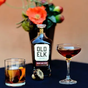 a bottle of old elk and a glass of old elk