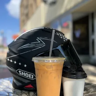 a helmet and a drink