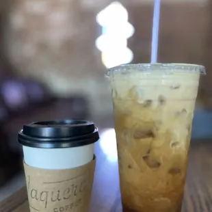 a cold beverage and a coffee cup