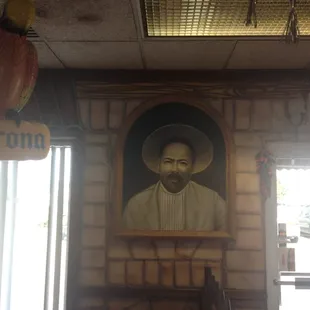 a portrait of a mexican man in a restaurant