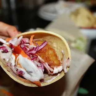 he Baja Fish taco was made with Haddock, tortilla, cabbage, and a Mexican-style crema, Valentina™ hot sauce.