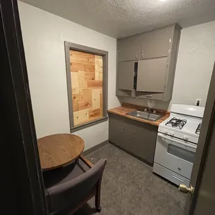 We have a few kitchenettes. The old exterior windows I turned into art pieces.