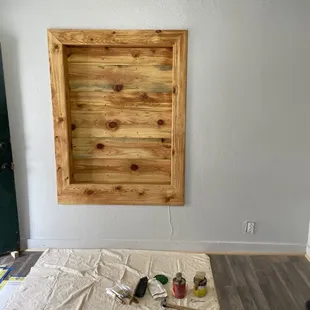 Old exterior window; hardwood laminate flooring in all renovated rooms.