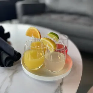 Orange / Pineapple / Lemonade / Cranberry Mimosas flight.