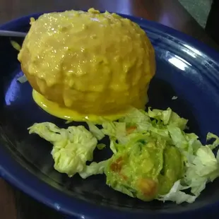 Puffy tortillas with queso served with &quot;el grande&quot;