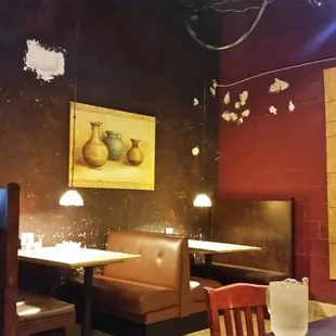 That is plywood over a window and patching all over the walls.