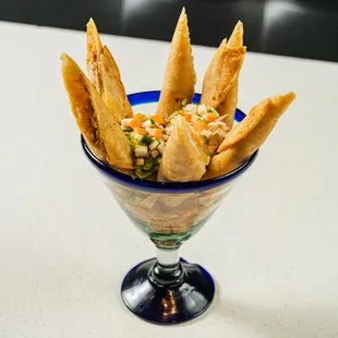 a blue glass filled with food