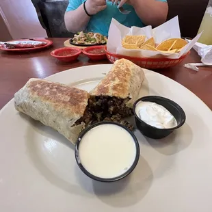 This is a burrito. It was good. No onions in the beef (like some places do). It was really good.