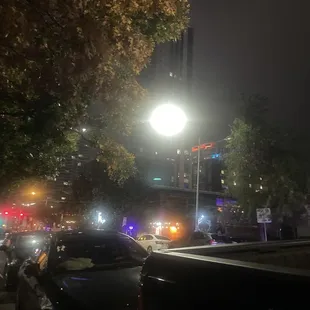 a view of a busy city street at night