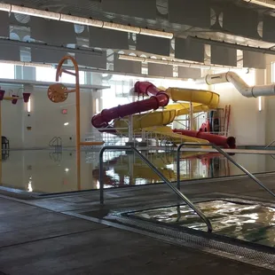 Rio Rancho Aquatic Center's rec pool.  Slides are unmanned because they're not running since there's no open swim right now.