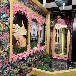 a woman&apos;s reflection in a mirror