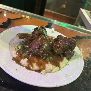 Oxtail and grits
